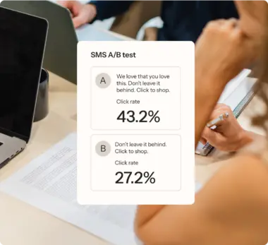 SMS A/B test results displayed on a screen, showing option A with a 43.2% click rate and option B with a 27.2% click rate.